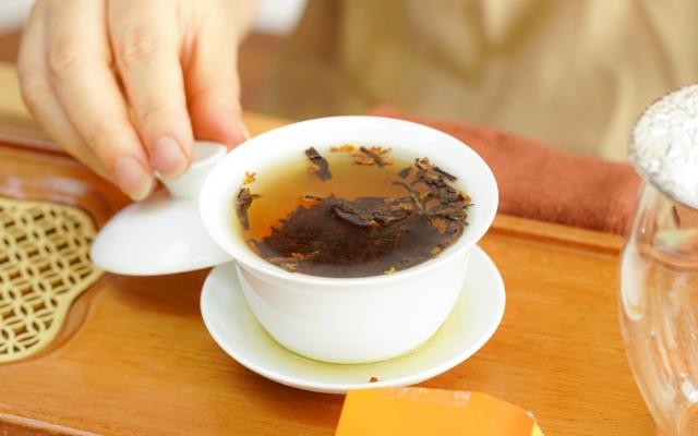 丹桂茶香飘两岸，一盏芬芳润千年